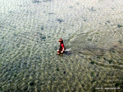 Boy in Mousehole harbour